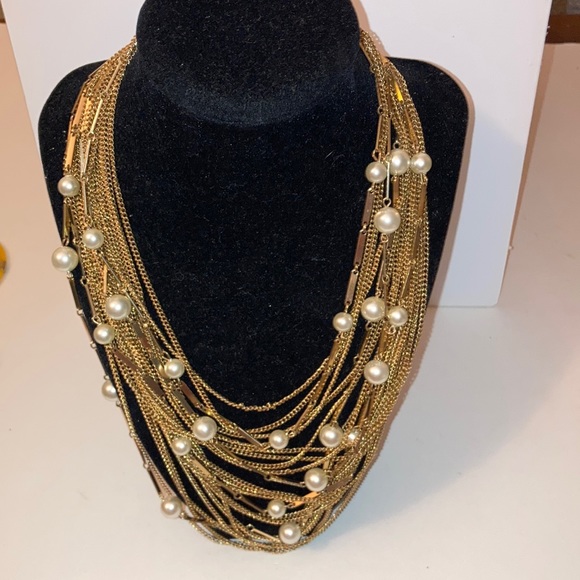 Vintage Jewelry - Exquisite Gold Tone Faux Pearl Multi Strand .       Beautifully designed.